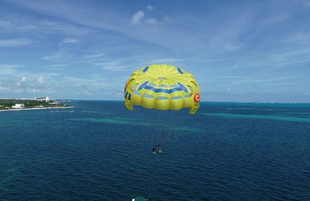 Fly Above Cancun Bay: Parasailing Experience