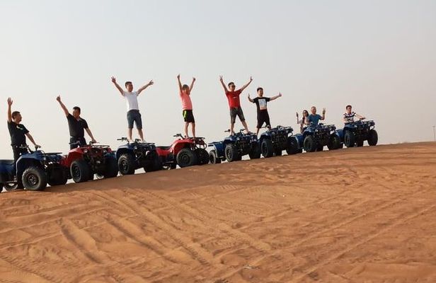 Evening Safari with Quad Bike, Camel Riding, BBQ Dinner and Dune Bashing