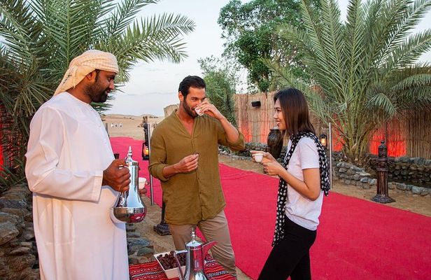 Dubai Evening Desert Safari: Sandboarding, BBQ, Camel Ride & more