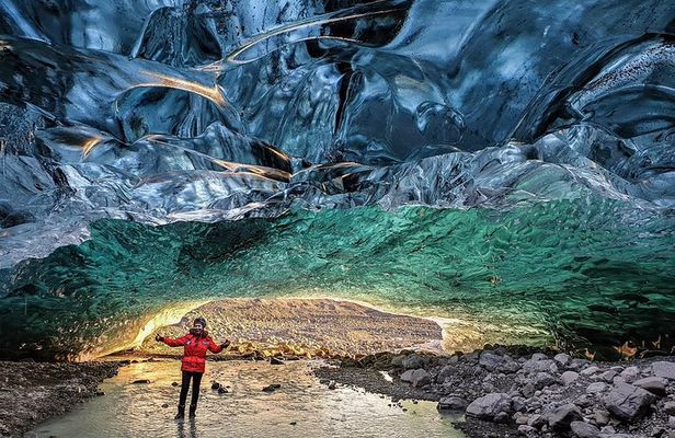 Ice Cave and Glacier walk into blue glacier canyon