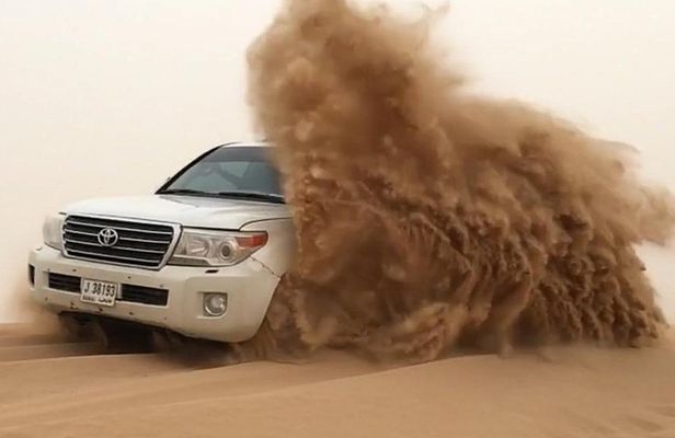 Desert Tour with Sand Boarding & Camel Riding