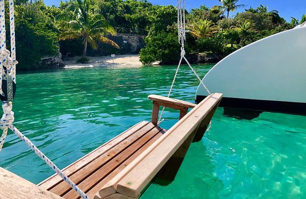 Lil Restless Private Catamaran Adventure - Snorkel SUP Cliff jump