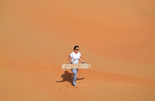 Exclusive Sunrise Desert Safari with Camel Ride Sand Boarding Dune Bashing