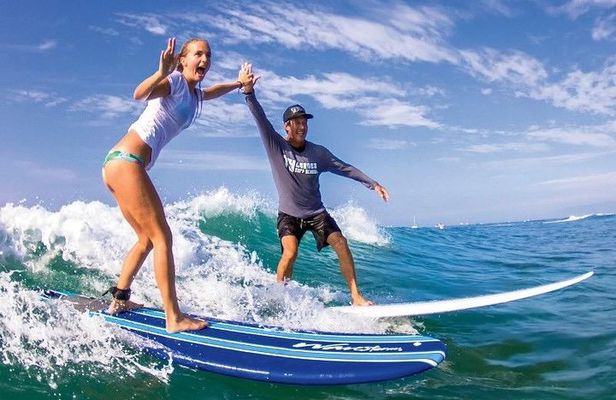 Surf with ALOHA SURF SCHOOL