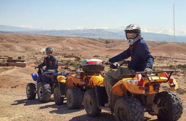 Quad biking in the road to the dam in Marrakech