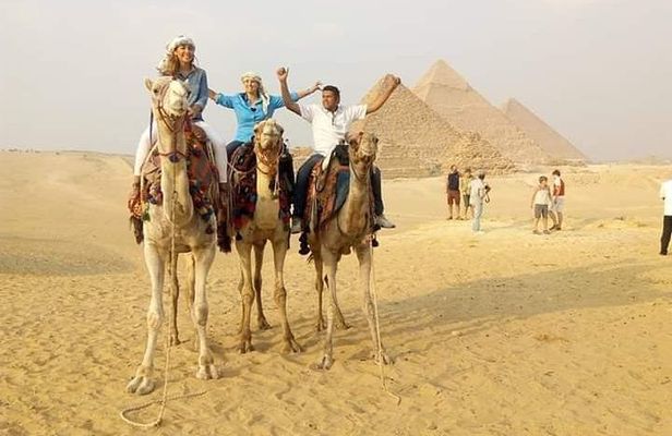 Sunset Camel Ride and Light Show from Cairo