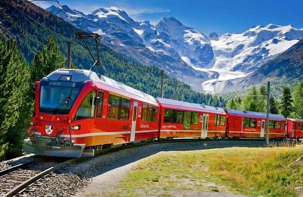 Bernina train and Swiss Alps. Departure from Desenzano
