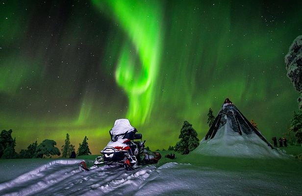 Hunting Northern Lights by Snowmobiles