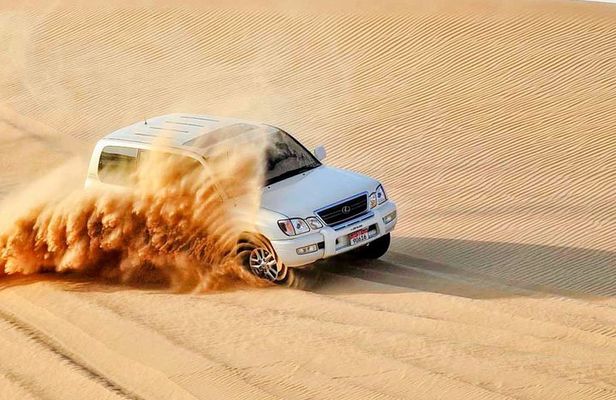 Red Dunes , Sandboarding, Camel Ride & BBQ at Al Khayma Camp