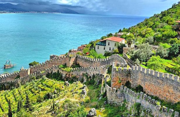 from city of Side: Alanya city tour with lunch and boat trip
