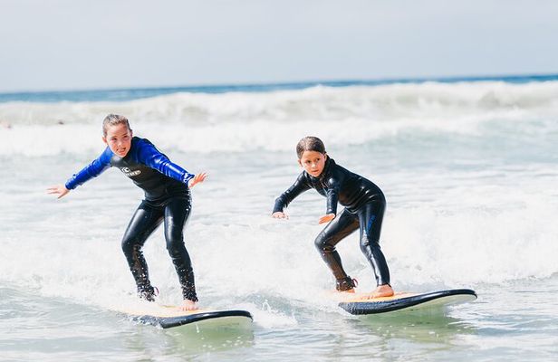 1h15min surfing lessons in Victoria Bay & Wilderness