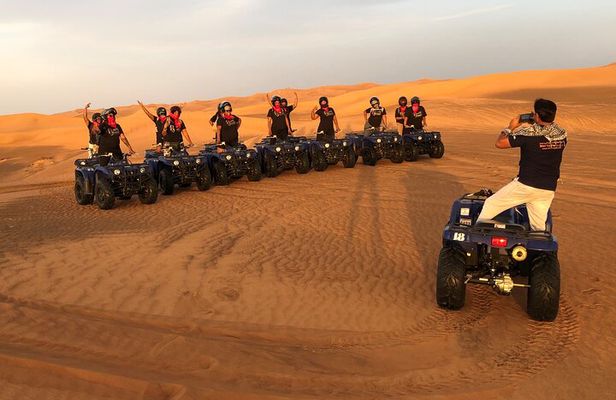 Self-drive Quad Bike with Sand Boarding and Camel Ride in Dubai