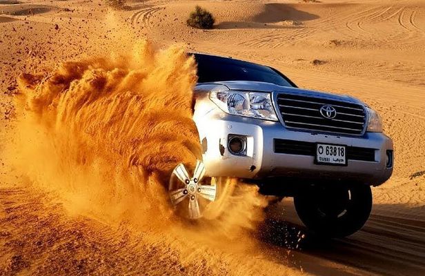 Evening Red Dunes Desert Safari: BBQ Dinner & Adventure Awaits!