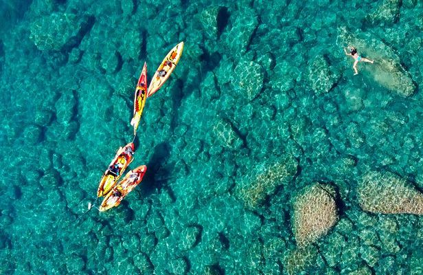 Costa Brava Day Adventure: Kayak, Snorkel & Cliff Jump with Lunch