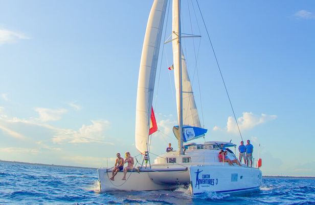 Luxury Sailing Experience to Isla Mujeres with Lunch & Open Bar
