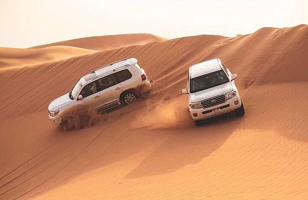 Red Dunes Dubai Desert Safari with Live show, Sandboarding & BBQ