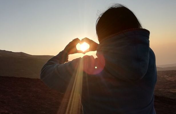Etna excursions at sunset through ancient craters and lava flows
