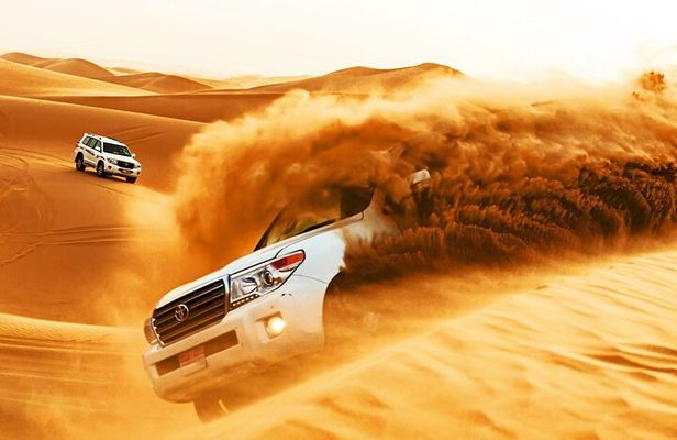 Dubai Desert Safari with Dune Bashing, Camel rides & BBQ Dinner
