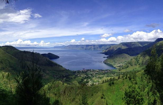 One day tour to explore brastagi High land & lake Toba departure from Medan