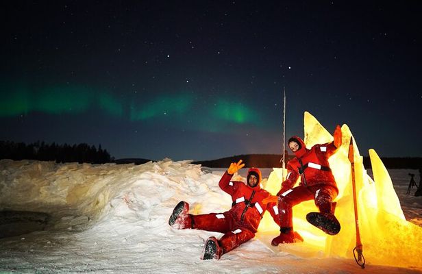 Ice Floating in Forest Lake with Aurora Borealis