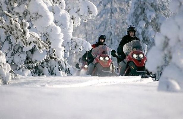 Snowmobile Safari through Lappish Forest from Rovaniemi