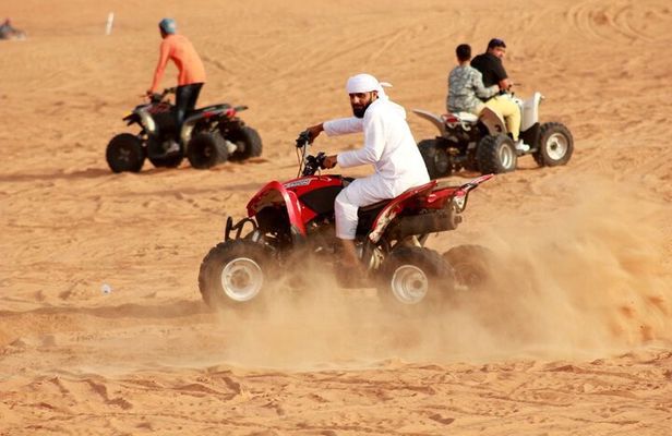 1-Hour Quad Bike Adventure: BBQ Dinner, Sandboarding & Shows!