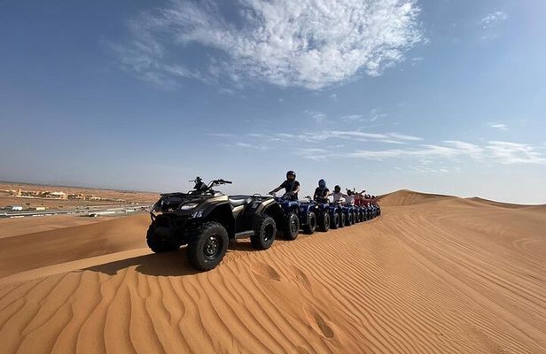 Guided Desert Quad Safari with Camelride, BBQ-Dinner and live-Shows