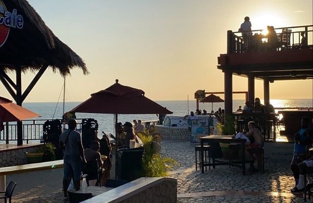 Negril 7 mile Beach, Party Catamaran Cruise , Snorkeling and Ricks Cafe Combo