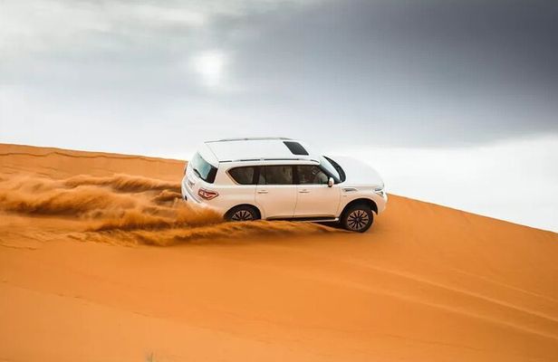 Evening Desert Safari With Camel Ride and Quad Bike Ride