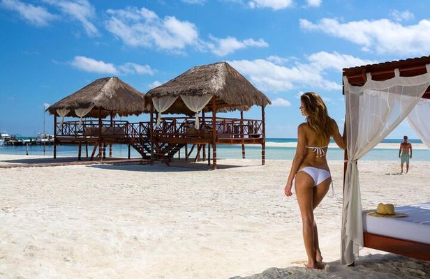 Full day pass in the best Beach Club in the Riviera Maya. Transport included