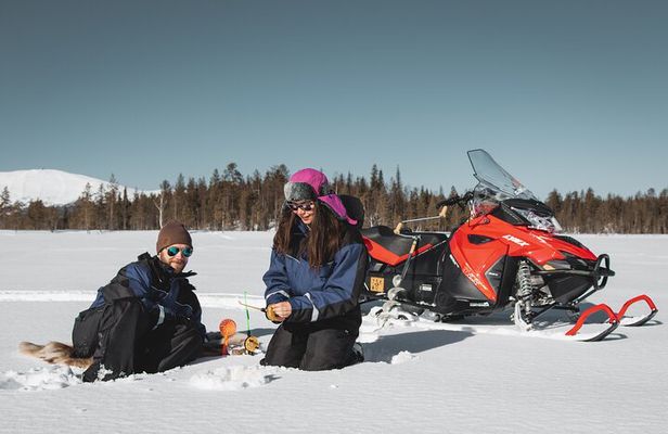 Lappish Lunch Break -Snowmobiling, ice fishing and tasty food