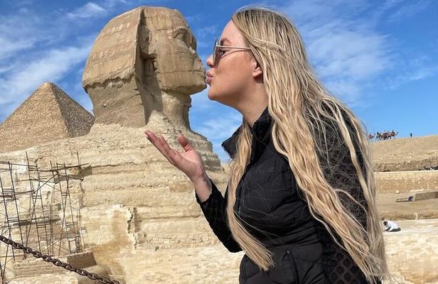 Private Half-Day guided Trip to Giza Pyramids with Camel-Riding