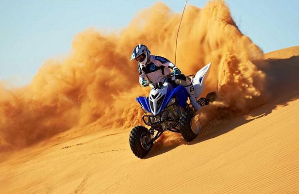 Red Dune Desert Safari with Quad Bike Camel Ride and BBQ dinner