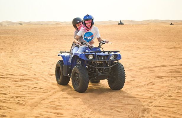Evening Desert Safari with Quad Bike, BBQ Dinner and Camel Ride