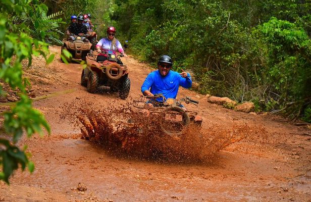 Awesome ATV experience in the jungle with cenote swim and ziplines included