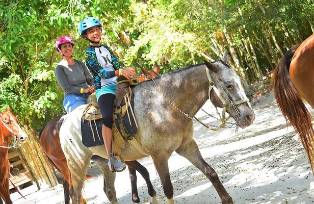 Horseback riding and ATV in the jungle. Zip line & cenote in Quintana Roo.