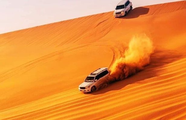 Sunset Red Dune Evening Safari, Camel ride, shows & BBQ Dinner