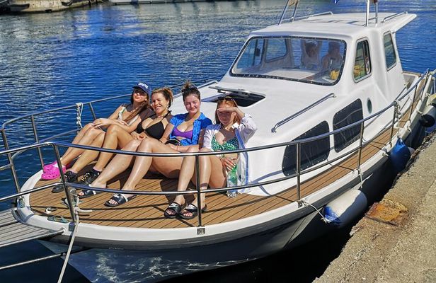 Visit 2 Islands of Zadar on a traditional wooden boat during half-day trip