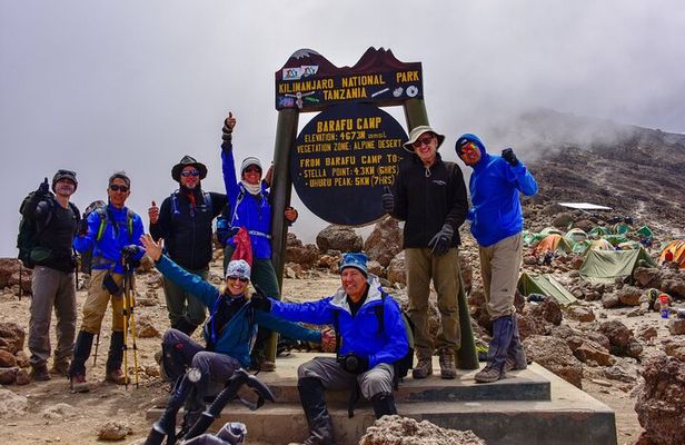 Climb Mt. Meru and 4 hours Game drive Safari.