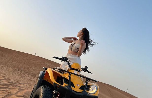 Dubai Desert Safari with Quad Bike, sandboarding, live show & BBQ