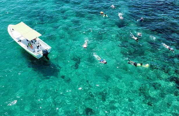Boat ride to the Arch and Snorkel
