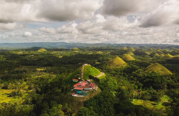 Famous Bohol Chocolate Hills Loboc River Cruise Tarsier Tour