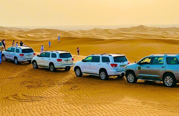 Afternoon Desert Safari with Quad Bike, Camel Ride and Sandboarding