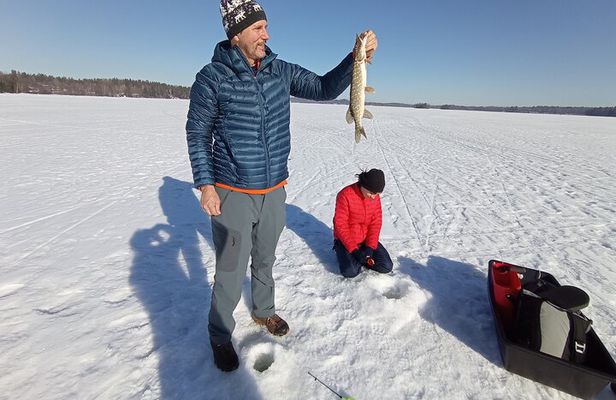 Ice fishing experience with Backpacker Helsinki Tour