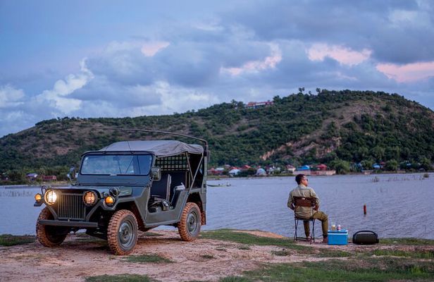 Countryside and sunset with Military Jeep