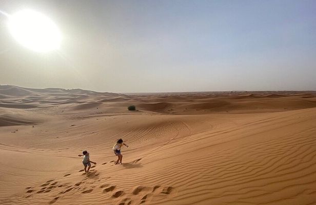 Morning Desert Safari with Dune Bashing, Camel Ride, Sand Board & Quad Biking