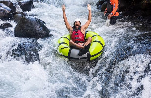 Guachipelin Zipline, River Tubing, Horseback Ride, Hot springs & Lunch Combo