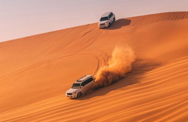 Dubai Desert Safari: Dune Bashing, Camel Ride & BBQ Dinner
