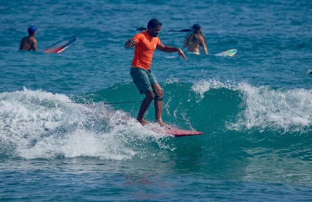 Surfing lesson at beautiful beach Playa Encuentro