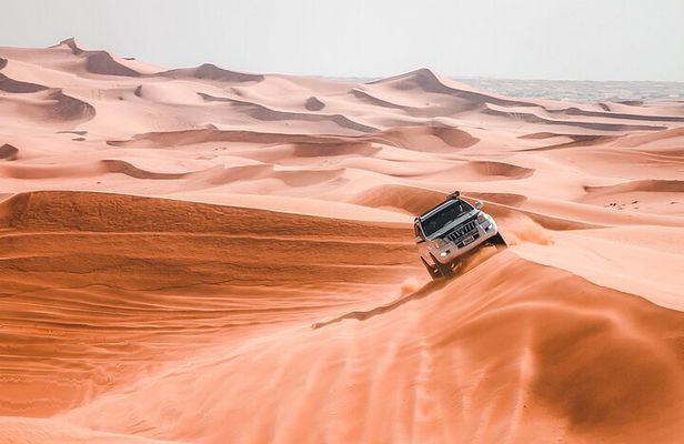 4 Hours Evening Desert Safari Camel Ride Sand Boarding 